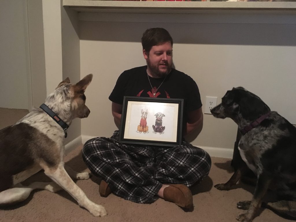 The dogs love their drawing.